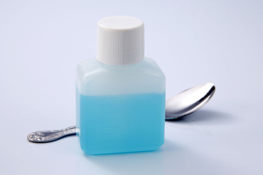liquid medicine in the plastic bottle