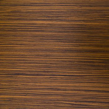 Zebrawood design of brown and black striped color on a laminated table top.