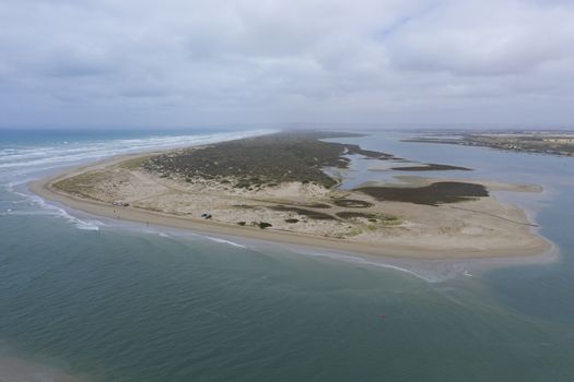Aerial view of people fishing at the mouth of the Murray River in South Australia
