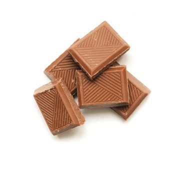 some milk chocolate bars isolated on white background. Sweet snack.