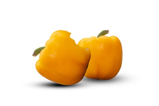 Bite yellow bell pepper  isolated on white background