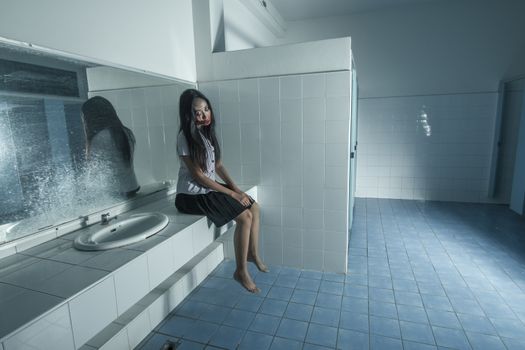 woman ghost in Thai university uniform in restroom