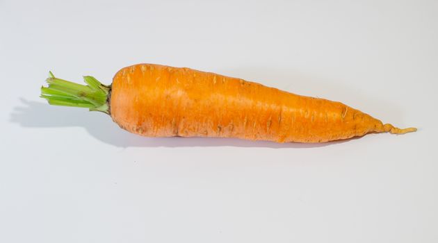Large, fresh carrot isolaLarge, fresh carrot isolated on a white backgroundted. High quality photo