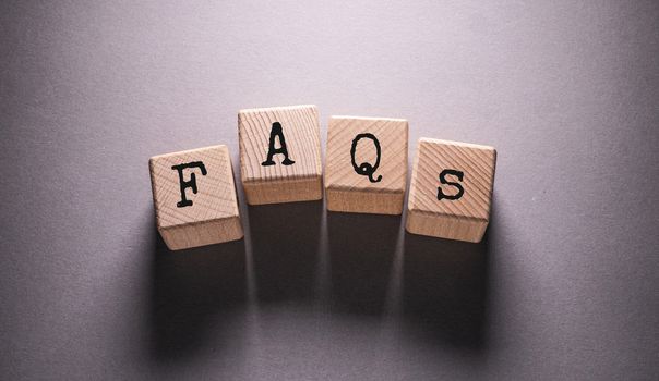 FAQ Word Written on Wooden Cubes