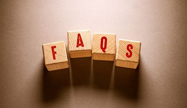 FAQ Word Written on Wooden Cubes