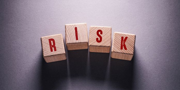 Risk Word Written on Wooden Cubes