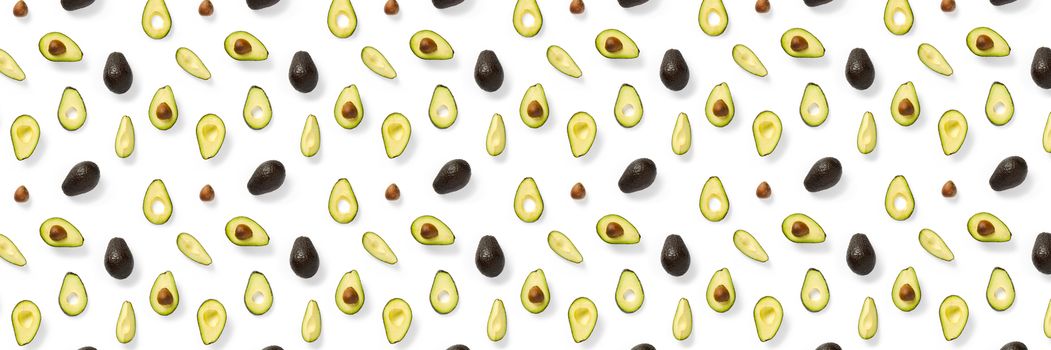Avocado banner. Background made from isolated Avocado pieces on white background. Flat lay of fresh ripe avocados and avacado pieces