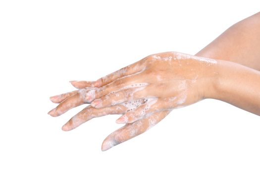 Closeup woman's hand washing with soap isolated on white background