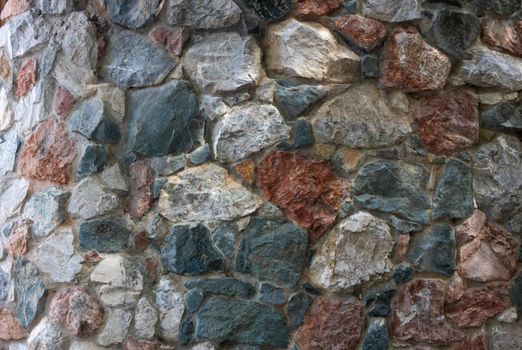 The wall is made of colored stones.Design style wall decor