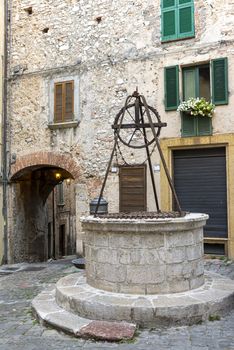 stroncone,italy september 11 2020:well in piazza san giovanni inside the walls