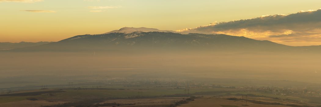 Dramatic sunrise of Vitosha mountain, Sofia, Bulgaria. Panorama.