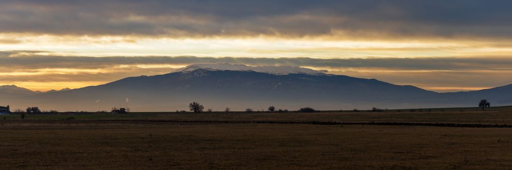 Dramatic sunrise of Vitosha mountain, Sofia, Bulgaria. Panorama.