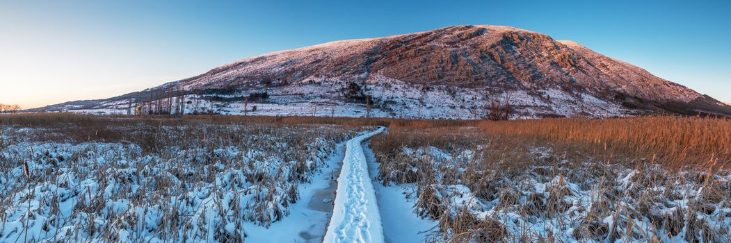 Way in the snowy Pond in Bulgaria paradise national park. Panorama.