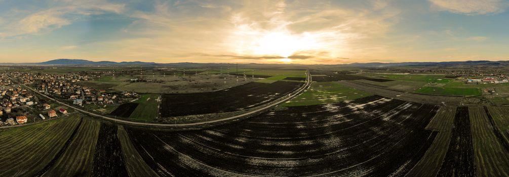 Aerial view of the railway section in Bulgaria at beautiful sunset. Panorama.