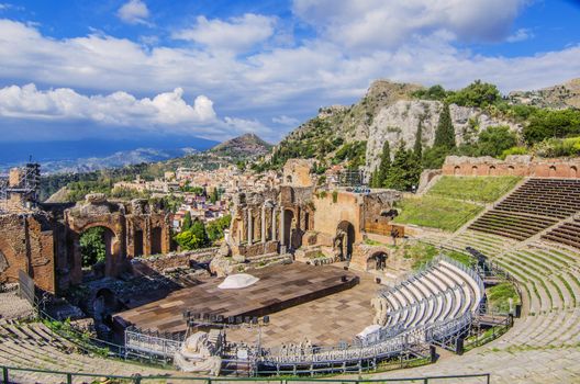 General view of the taormina theater the city of taormina and Sicilian territory background