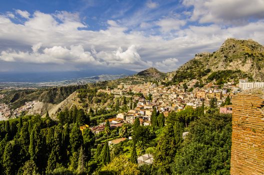 View of the city of taormina and the geography that surrounds it from the ruins of the ancient Greek theater