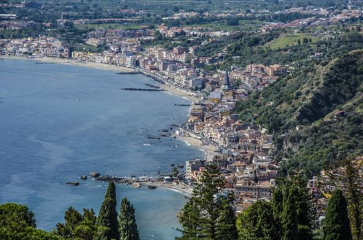 Panoramic view of the Mediterranean sea bathing the beaches of a city and irregularities of the Sicilian territory