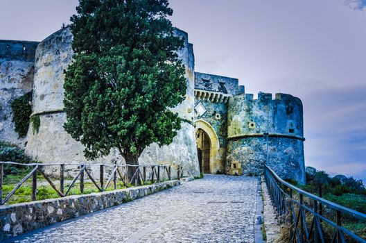 Ancient medieval street leading to Norman castle overlooking the city of milazzo sicily italy