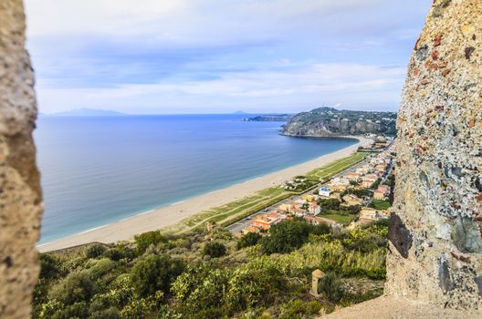 Defenses of the Norman castle of milazzo coastline with beaches of the Tyrrhenian Sea and on the horizon you can get to see the outline of the Aeolian Islands