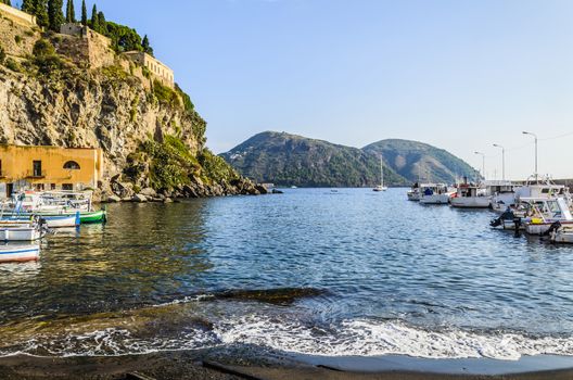Coast and mooring of fishing boats and stroll on the Tyrrhenian Sea on the eolian  island of  lipari