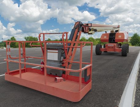 Horizontal shot of a generic unbranded boom lift from the front.