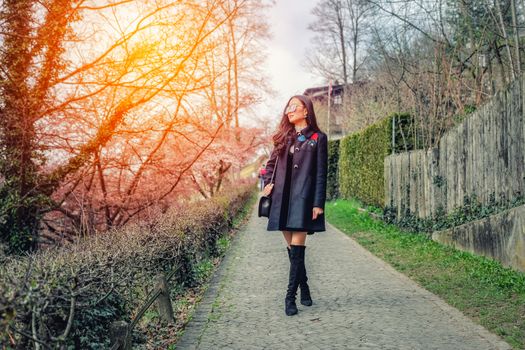 Young Beautiful Woman Tourists in view point near old town in Bern, Switzerland
