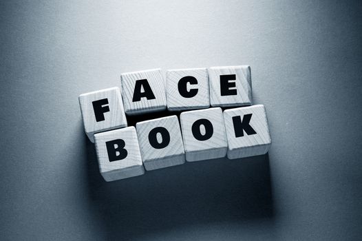 Face BooK Word Written on Wooden Cubes