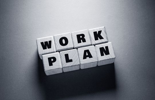 Work Plan Word Written on Wooden Cubes