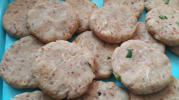 Spicy and tasty uncooked kebab stuffed with minced meat, onion,  alo paste and chana. Asian spicy cuisine.