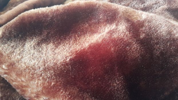 Closeup macro view of colorful soft blanket for winter season