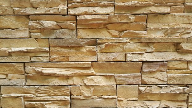 Gray cement stone wall for texture and background abstract. Wall texture with shiny stone put side by side