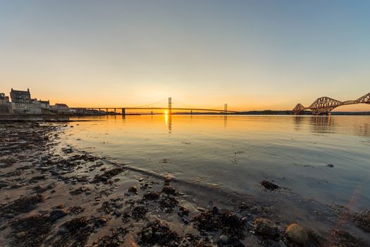 South Queensferry in Scotland and the bridges at sunset