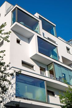 A white modern apartment house seen in Berlin
