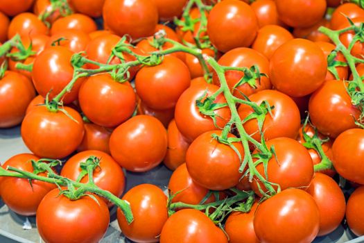 Red ripe tomatoes for sale at a market