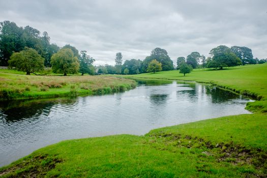 a bend in the River Bela at Dallam Park, Milnthorpe, Cumbria, England