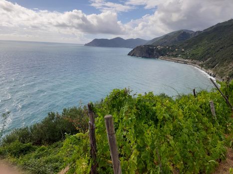 Cinque Terre, Italy - 09/02/2020: Beautiful landscape of a coastal fishing village, amazing view on many little colorful houses, traditional architecture of the little Italian town called Cinque Terre