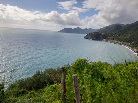 Cinque Terre, Italy - 09/02/2020: Beautiful landscape of a coastal fishing village, amazing view on many little colorful houses, traditional architecture of the little Italian town called Cinque Terre