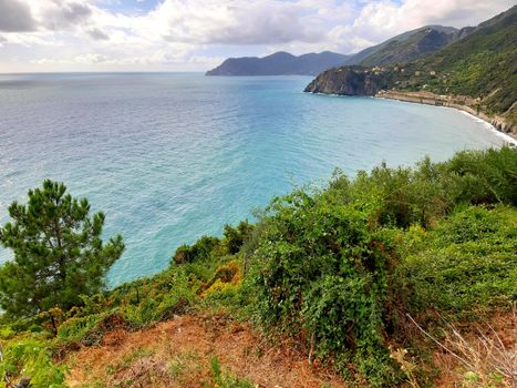 Cinque Terre, Italy - 09/02/2020: Beautiful landscape of a coastal fishing village, amazing view on many little colorful houses, traditional architecture of the little Italian town called Cinque Terre