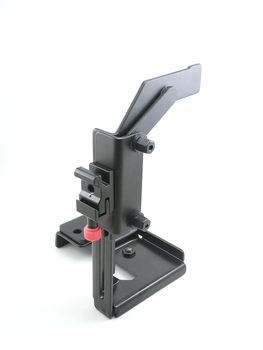 Black adjustable metal flash bracket photography accessory use to minimize the shadow of subject in portrait position