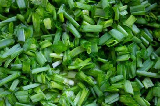 Fresh sliced green onions for salad, okroshka, soup.