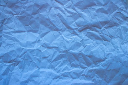 light blue trendy paper texture. Crumpled paper in light blue color.