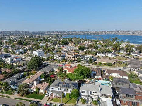 Aerial view of Mission Bay and beaches in San Diego, California. USA. Community built on a sandbar with villas and recreational Mission Bay Park. Californian beach-lifestyle.
