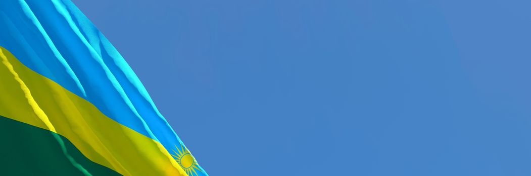 3D rendering of the national flag of Rwanda waving in the wind against a blue sky