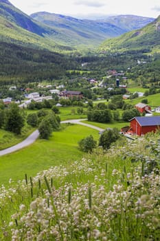Panorama Norway, Hemsedal Mountains, red farmhouses and green meadows, Viken, Buskerud.