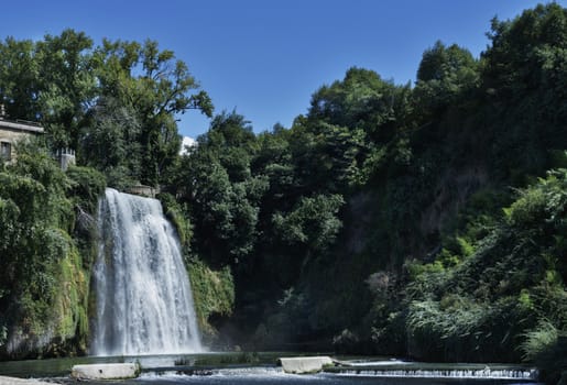 The cascata grande -Waterfall -in the historic centre of Isola del Liri -Italy - in the background castle Boncompagni-Viscogliosi