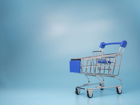 Shopping mall cart model On a blue background.