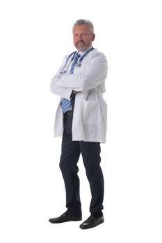 Caucasian mature male medical doctor with stethoscope isolated on white background, full length portrait