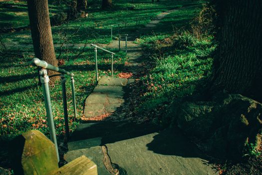 An Ornate Stone Walkway With Metal Railings at the Elkins Estate