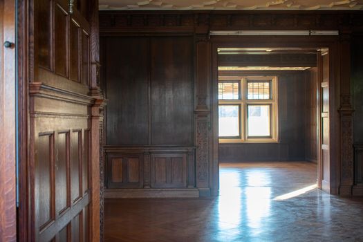 Looking Inside an Old Fashioned Building With an Antique Dark Brown Wood Interior