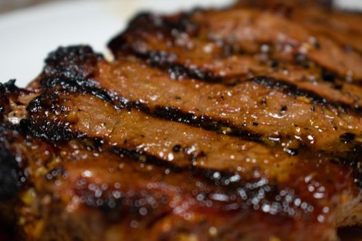 A close Up Shot of a Perfectly Cooked Juicy Steak With Grill Lines